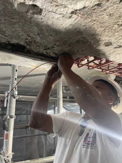 Contractor installing PatchGuard Connect Anodes